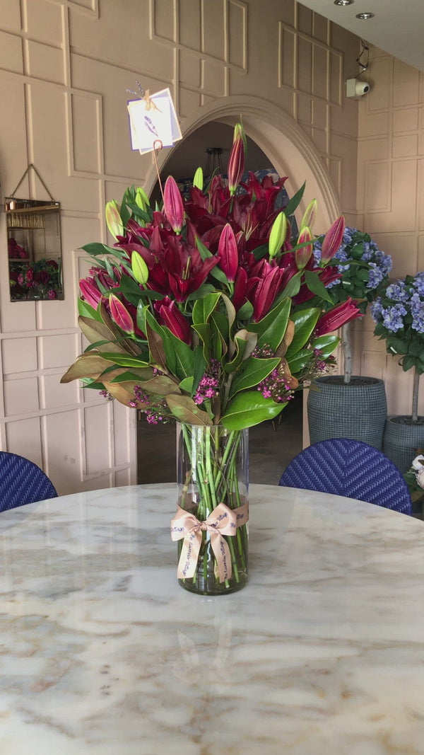 Caroline Lily with Cylinder Vase Flower Arrangement