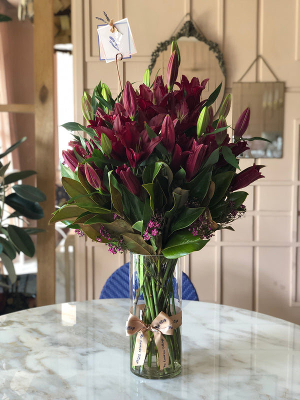 Caroline Lily with Cylinder Vase Flower Arrangement